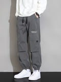 kkboxly  Men's Trendy Solid Cargo Pants With Multi Pockets, Casual Drawstrings Joggers For Outdoor