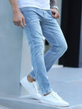 kkboxly  Slim Fit High Stretch Jeans, Men's Casual Street Style Distressed Denim Pants For All Seasons