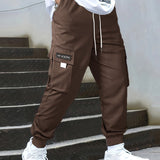 kkboxly  Tech Wear Multi Pocket Harem Pants, Men's Casual Stretch Waist Drawstring Cargo Pants