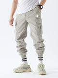 kkboxly  Men's Drawstring Flap Pocket Cargo Pants, Loose Trendy Jogger Pants