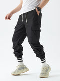 kkboxly  Men's Drawstring Flap Pocket Cargo Pants, Loose Trendy Jogger Pants