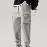 kkboxly  Corduroy Texture Multi Flap Pockets Cargo Pants, Men's Casual Techwear Drawstring Cargo Pants Hip Hop Joggers For Autumn Summer Outdoor