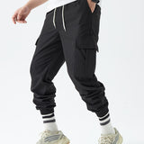 kkboxly  Men's Drawstring Flap Pocket Cargo Pants, Loose Trendy Jogger Pants