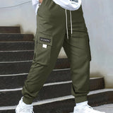 kkboxly Tech Wear Multi Pocket Harem Pants, Men's Casual Stretch Waist Drawstring Cargo Pants