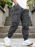 kkboxly  Men's Drawstring Cargo Pants With Flap Pockets, Loose Casual Comfy Jogger Pants