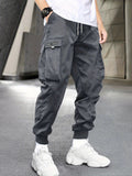 kkboxly  Men's Letter Graphic Drawstring Waist Cargo Pants With Flap Pockets