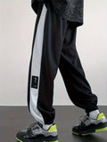 Chic Color Block Joggers, Men's Casual Stretch Waist Drawstring Sports Pants Sweatpants