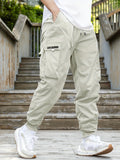 kkboxly  Men's Drawstring Cargo Pants With Flap Pockets, Loose Casual Comfy Jogger Pants