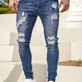 kkboxly  Slim Fit Ripped Jeans, Men's Casual Street Style Distressed Medium Stretch Denim Pants