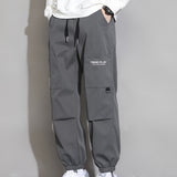 kkboxly  Men's Trendy Solid Cargo Pants With Multi Pockets, Casual Drawstrings Joggers For Outdoor