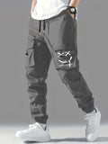 kkboxly  Smile Print, Men's Drawstring Cargo Pants, Flap Pocket Loose Trendy Jogger Pants, Mens Work Pants